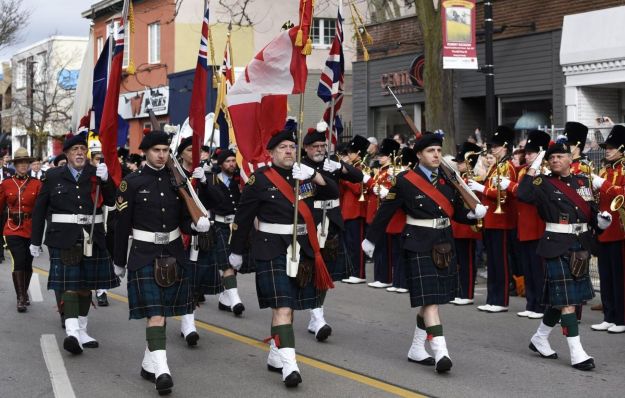 Members of Burlington’s Royal Canadian Legion Branch 60 march down Brant Street to the cenotaph in Veteran Square next to city hall, for a past local Remembrance Day ceremony.