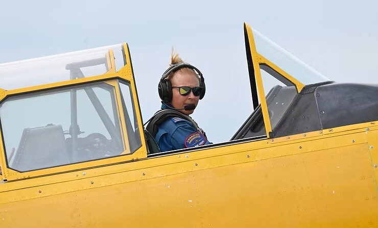 Cockpit open, Jamie MacDonald taxies down the runway for a flight. (Jeff Helsdon Photo)