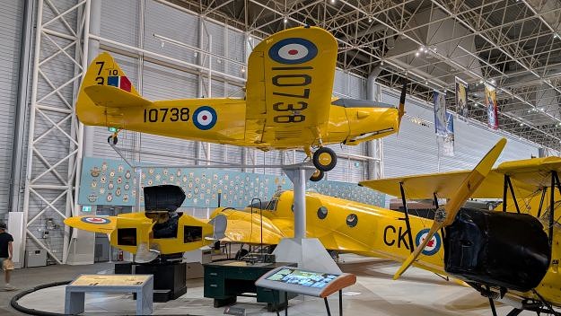 A ceiling suspended Fairchild Cornell aircraft and an Avro Anson featured at the Canada Aviation and Space Museum in Ottawa, photo Norm Jurgen