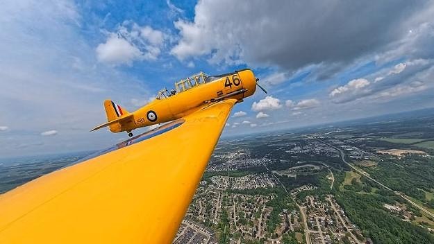 The wing camera situation on one of the Canadian Harvard Aircraft Association planes shows the Town of Tillsonburg under the plane. (Sean Voskamp photo).