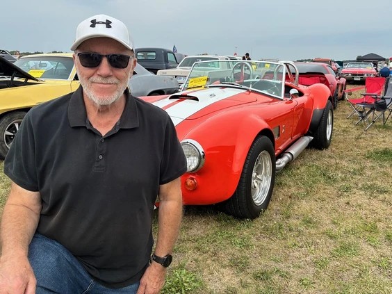 John Davis, of Waterford, was one many classic car enthusiasts to attend the annual Wings and Wheels Family Fun Day at the Tillsonburg Regional Airport on Saturday. The event is held by the Canadian Harvard Aircraft Association and attracts upwards of 3,000 people. Photo by Vincent Ball /Vincent Ball/The Expositor