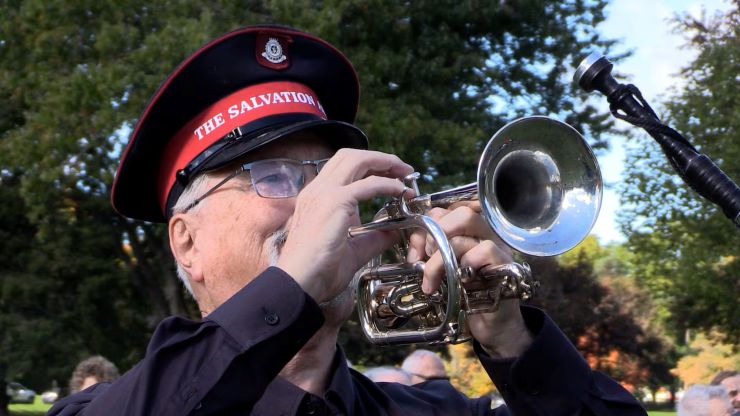 SA Major Gary Venables plays the bugle during the dedication ceremony of the Byron Springbank Veterans Monument on Oct. 3, 2026 (Brent Lale/CTV News London)
