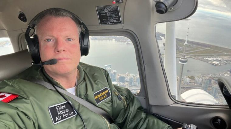 Michael Bremner circled the CN Tower in Toronto dozens of times in 2022 to raise awareness about elder abuse including financial crimes. Photo courtesy of Michael Bremner.