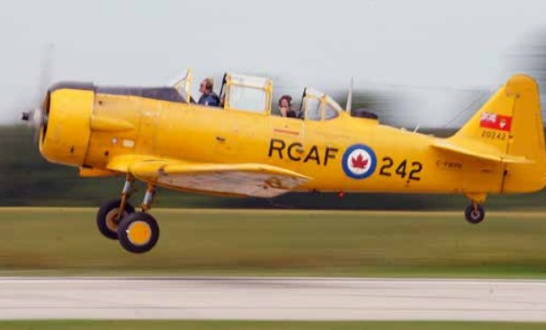 The Harvard pilots were busy at Wings and Wheels taking the public up for rides in the vintage aircraft and making the Tillsonburg Airport runway a busy place. There were 39 Harvard flights during the day (JEFF HELSDON PHOTO)
