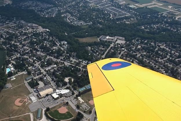This view from the open cockpit of a Harvard shows Tillsonburg from the community centre to Glendale High School and south down Broadway. (Jeff Helsdon Photo).